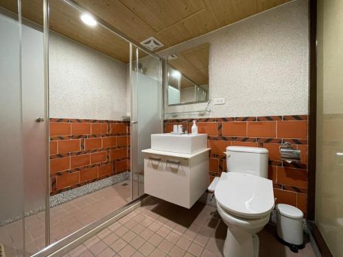 Un baño de 金門古寧歇心苑官宅古厝民宿 Guning Xiexinyuan Historical Inn
