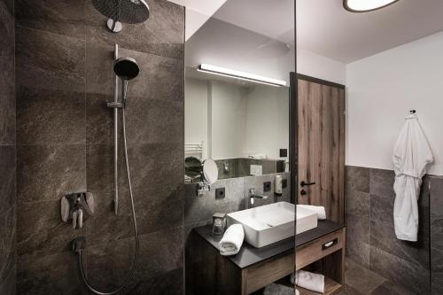 
Ein Badezimmer in der Unterkunft Hotel Kohlmais

