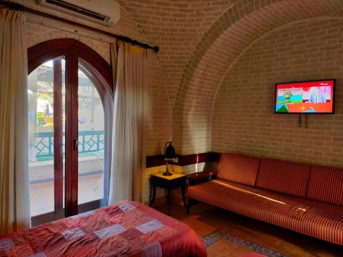 A bed or beds in a room at Nesima Resort