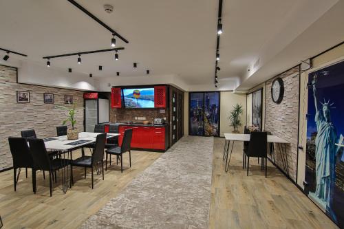 a dining room with a table and chairs at Battle Mile Hostel in Cherkasy
