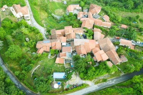 an overhead view of a house in a suburb at Borgo di Quarazzana holiday house with pool for groups Tuscany in Agnino