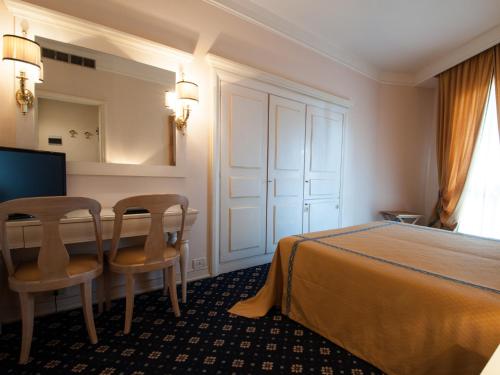 Hotel Michelangelo & Day SPAにあるベッド