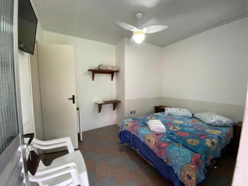 En eller flere senge i et værelse på Hotel Fazenda Fortaleza das Aguas