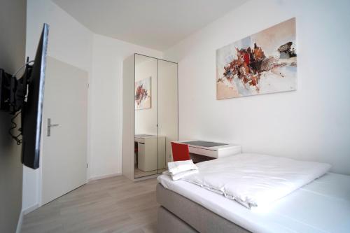 Postel nebo postele na pokoji v ubytování Hotel Böke Rheinfelden