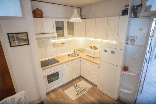 Kuchyň nebo kuchyňský kout v ubytování apartment Golden sunrise - 4 ul.petra svacica11