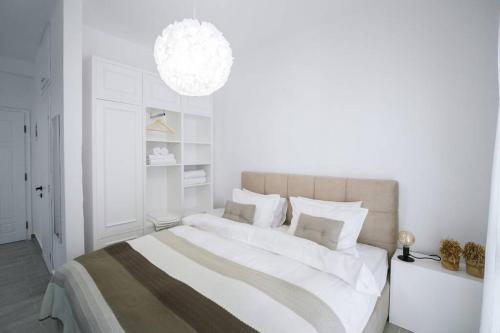 Posteľ alebo postele v izbe v ubytovaní Luxury Central Studio