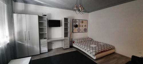 Posteľ alebo postele v izbe v ubytovaní Mérey Apartment