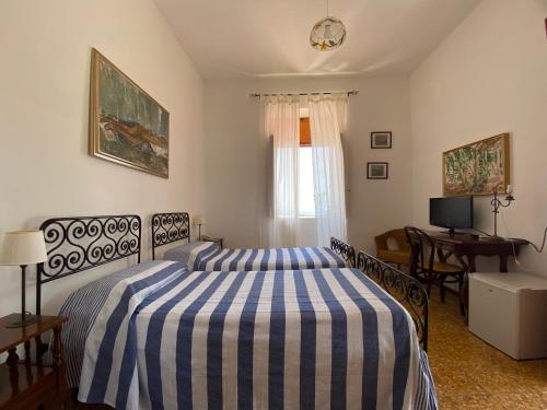 Кровать или кровати в номере Hotel Villa Diana