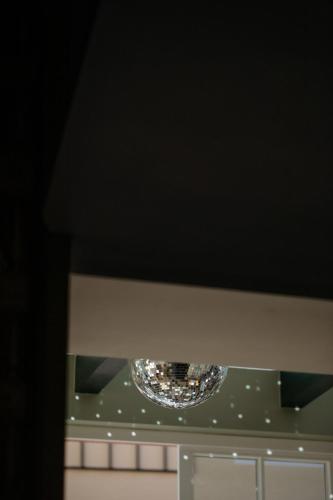 a chandelier hanging from a ceiling in a building at Hotel Goldener Ochs in Bad Ischl