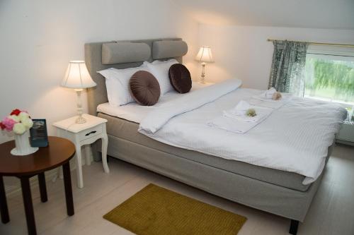 Ένα ή περισσότερα κρεβάτια σε δωμάτιο στο Appelberg hotel