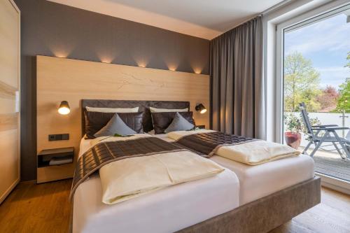 Katil atau katil-katil dalam bilik di Boutiquehotel zur Winzerstube - Adults Only