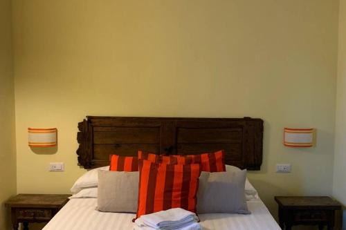 Uma cama ou camas num quarto em Azienda Agricola Maremma Bio