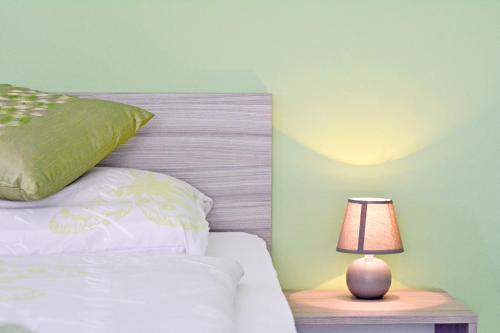 Katil atau katil-katil dalam bilik di Guest House Rudine
