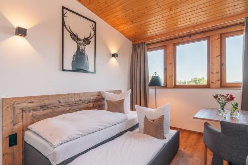 Un pat sau paturi într-o cameră la Landgasthaus Sonne
