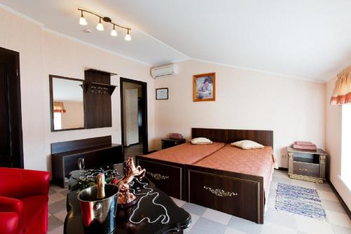 Posteľ alebo postele v izbe v ubytovaní Dergachov Guest House