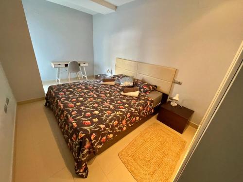 A bed or beds in a room at Calle la Cala, 2