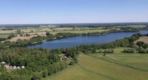 an aerial view of a river in the countryside at Naturcamping Perlin Ferienhaus in Perlin
