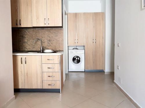Kuchyň nebo kuchyňský kout v ubytování Apartamenti Velvet