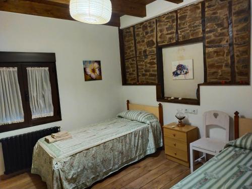 Posteľ alebo postele v izbe v ubytovaní La casita de la señora María