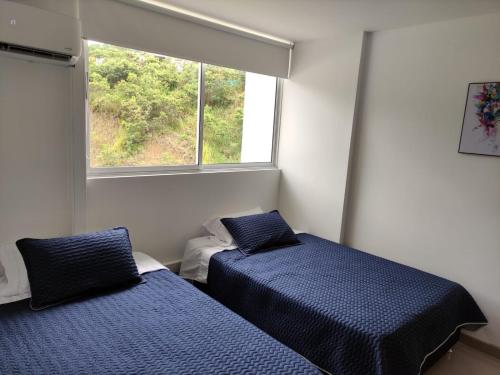 Una cama o camas en una habitación de Casitadisol