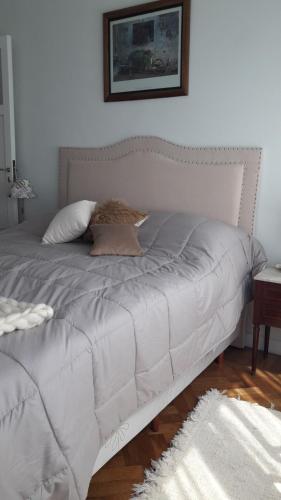 Postel nebo postele na pokoji v ubytování TANGO GUAPO APART