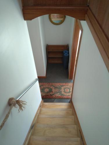 an overhead view of a staircase in a house at Cherry Top Farmstay - Boutique Eco Village in Lilydale