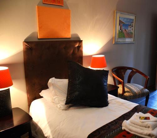 Cama o camas de una habitación en Two Bells Guest House