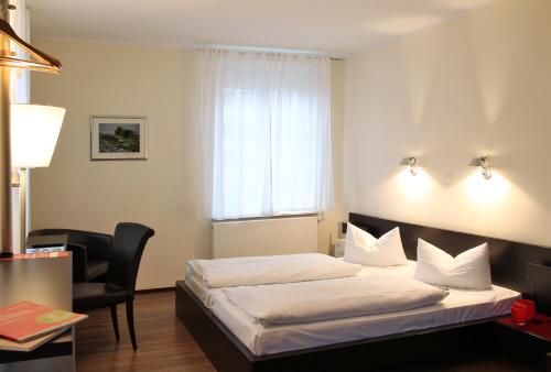Postel nebo postele na pokoji v ubytování Von Korff´S Rest & Relax Hotel