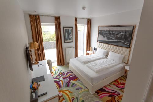 Postel nebo postele na pokoji v ubytování A Hotels Glostrup