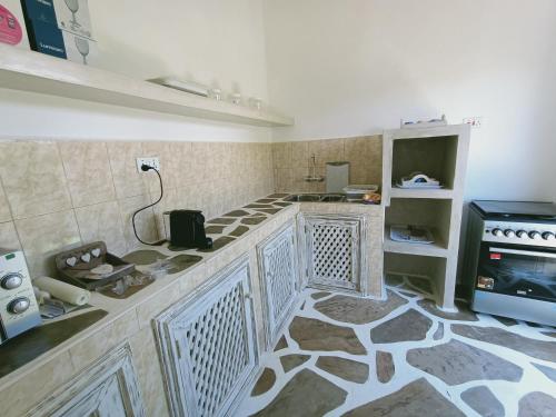 Kjøkken eller kjøkkenkrok på Neverland Watamu Villas