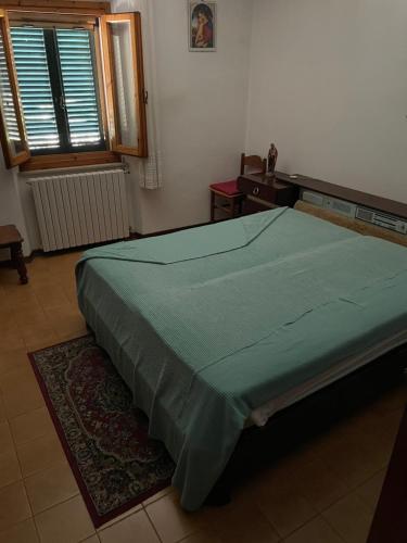 Ein Bett oder Betten in einem Zimmer der Unterkunft Casale Me