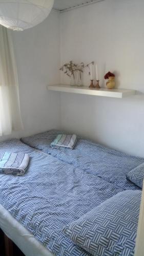 Tempat tidur dalam kamar di 6 Fyrrevej, Noerre Lyngby