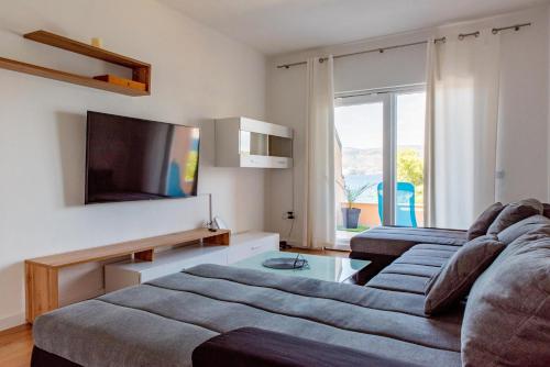 Foto Beach Holiday home with private jacuzzi & parking 6