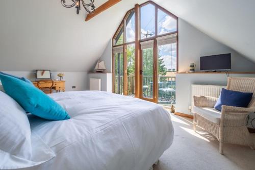Ένα ή περισσότερα κρεβάτια σε δωμάτιο στο The Granary, Dunstall Green