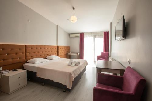 Cama ou camas em um quarto em Edirne Adres Karaağaç