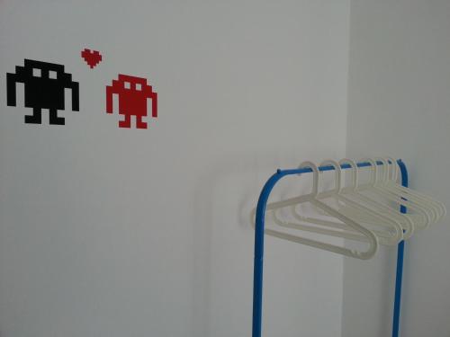 a white wall withminecraft on it with a wall at Lemon Tree Apartments in Faro