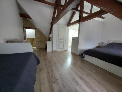 Postelja oz. postelje v sobi nastanitve Appartement centre-ville Bayeux, tout à pied !