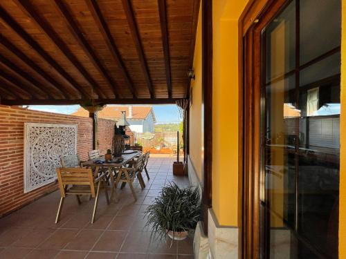 Balkón nebo terasa v ubytování Las Casitas de Santillana