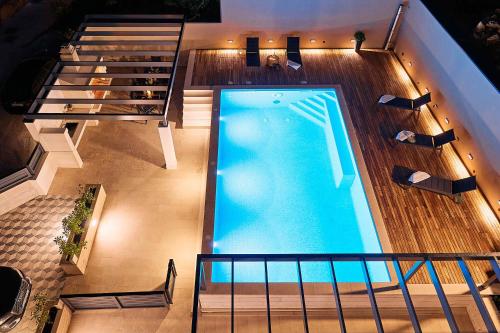 an overhead view of a swimming pool in a building at Sun Spalato Hills in Split