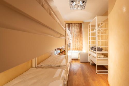Katil dua tingkat atau katil-katil dua tingkat dalam bilik di Leie Villa