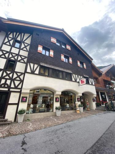 a building with a black and white building at Apartment 54 in Sankt Anton am Arlberg
