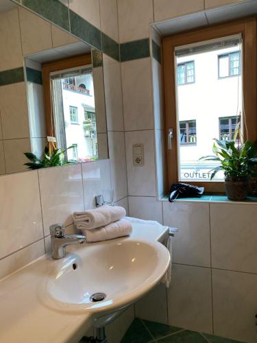 a bathroom with a sink and a mirror at Apartment 54 in Sankt Anton am Arlberg