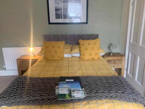 A bed or beds in a room at Wentworth Guest House 