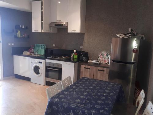 Η κουζίνα ή μικρή κουζίνα στο Appartement résidence Evasion piscine plage Bouznika