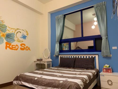 Katil atau katil-katil dalam bilik di Qing Feng Diving B&B