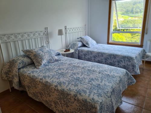 Postel nebo postele na pokoji v ubytování Mar azul en puerto azul