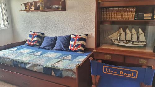 Ένα ή περισσότερα κρεβάτια σε δωμάτιο στο Apartamento en primera linea en la Playa de San Juan