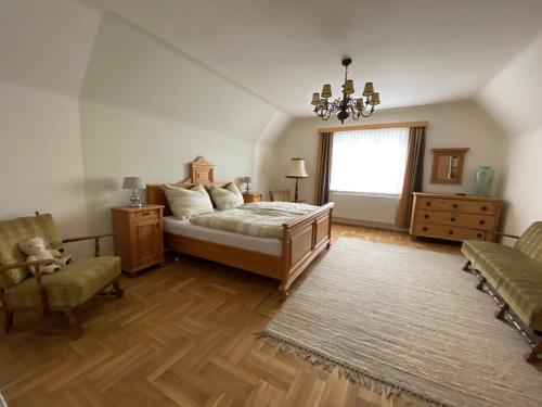 Tempat tidur dalam kamar di Bauernhaus Süd- West- Steiermark für Radfahrer, Familien- und Feste mit Freunden