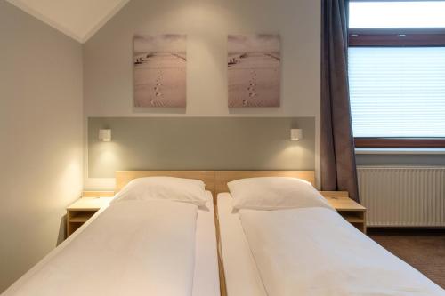 Katil atau katil-katil dalam bilik di Hotel & Restaurant Prüser´s Gasthof
