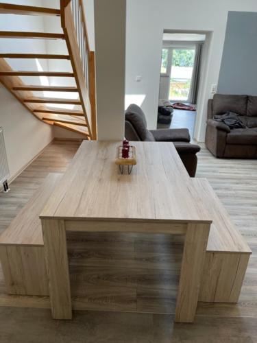 a wooden coffee table in a living room at Ferienwohnung Einstein in Feldkirch